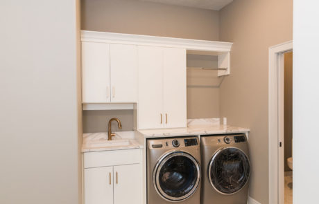 Interior design white cabinet laundry space