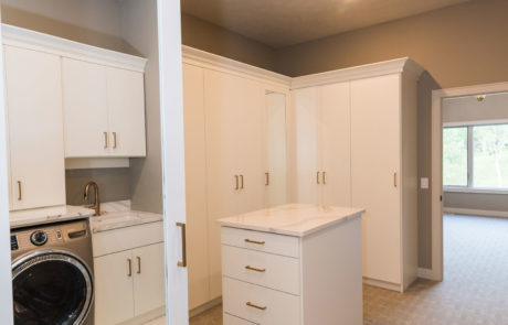 Interior design white cabinet laundry space
