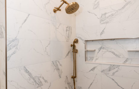 White and gray marble style shower space