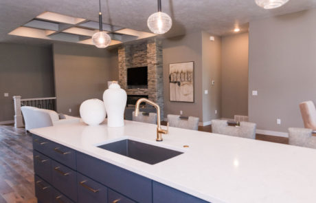 Interior design white and dark blue accent kitchen space